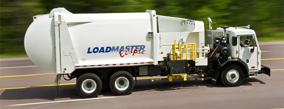 loadmaster refuse truck on highway